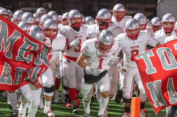 The Mentor Cardinals take the field.