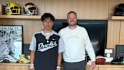 Five-star athlete Honor Fa'alave-Johnson poses with Oregon Ducks coach Dan Lanning