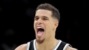 Dec 1, 2025; Brooklyn, New York, USA; Brooklyn Nets forward Michael Porter Jr. (17) reacts with guard Egor Demin (8) during the fourth quarter against the Charlotte Hornets at Barclays Center. Mandatory Credit: Brad Penner-Imagn Images