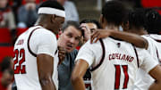 Dec 6, 2025; Raleigh, North Carolina, USA; NC State Wolfpack huddle with head coach Will Wade during the second half of the game against UNC Asheville Bulldogs at Lenovo Center. Mandatory Credit: Jaylynn Nash-Imagn Images