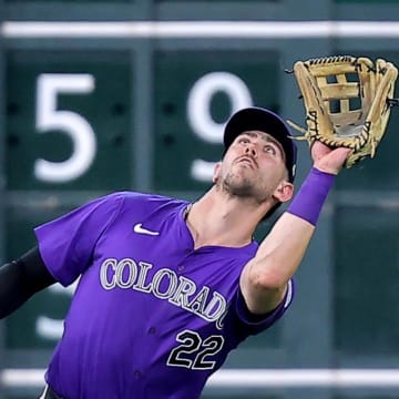 Colorado Rockies left fielder Nolan Jones (22) catches a fly ball for an out against the Houston Astros during the fourth inning at Minute Maid Park on June 26.