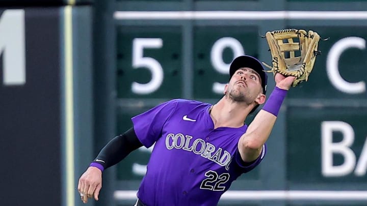 Colorado Rockies left fielder Nolan Jones (22) catches a fly ball for an out against the Houston Astros during the fourth inning at Minute Maid Park on June 26.