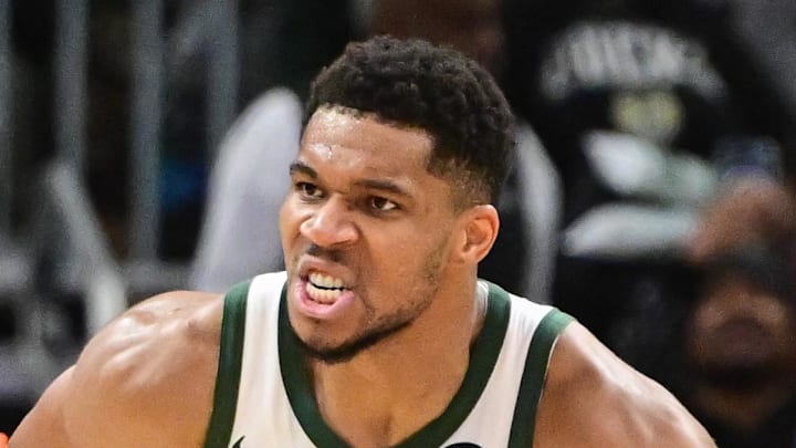 Milwaukee Bucks forward Giannis Antetokounmpo (34) reacts after scoring a basket in the 3rd quarter as New York Knicks guard Mikal Bridges (25) looks on at Fiserv Forum on October 28, 2025.