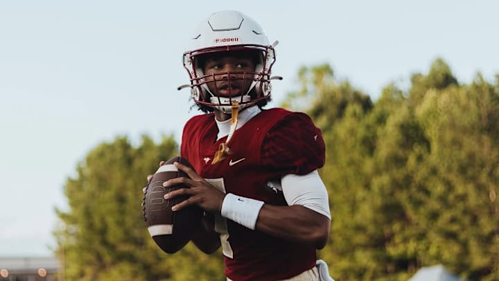 Creekside quarterback Cayden Benson ran for two touchdowns and passed for another to lead the Seminoles past Benedictine, 42-39, in the Class AAAAA championship game at Mercedes-Benz Stadium in Atlanta on Dec. 15, 2025. Creekside quarterback Cayden Benson ran for two touchdowns and passed for another to lead the Seminoles past Benedictine, 42-39, in the Class AAAAA championship game at Mercedes-Benz Stadium in Atlanta on Dec. 15, 2025.