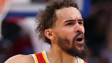 Trae Young #11 of the Atlanta Hawks reacts against the Detroit Pistons.