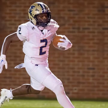 Thomas County Central running back Christian Lawrence rushed for 4 touchdowns and had a monster night to lead the 14-0 Yellow Jackets to a 49-28 victory against Roswell, earning a trip to the GHSA 5A state championship game.