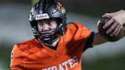 Platte County three-star senior quarterback Rocco Marriott scored a touchdown with 2 seconds remaining to help his No. 1 Pirates overcome No. 14 Rockhurst in a Class 5 District 8 thriller Friday night at Platte County High School.