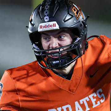 Platte County three-star senior quarterback Rocco Marriott scored a touchdown with 2 seconds remaining to help his No. 1 Pirates overcome No. 14 Rockhurst in a Class 5 District 8 thriller Friday night at Platte County High School.