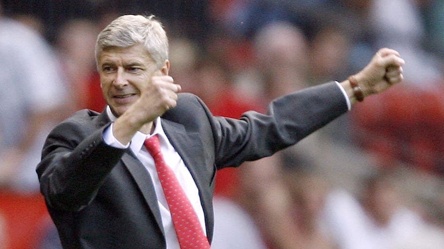 Arsène Wenger celebrating.