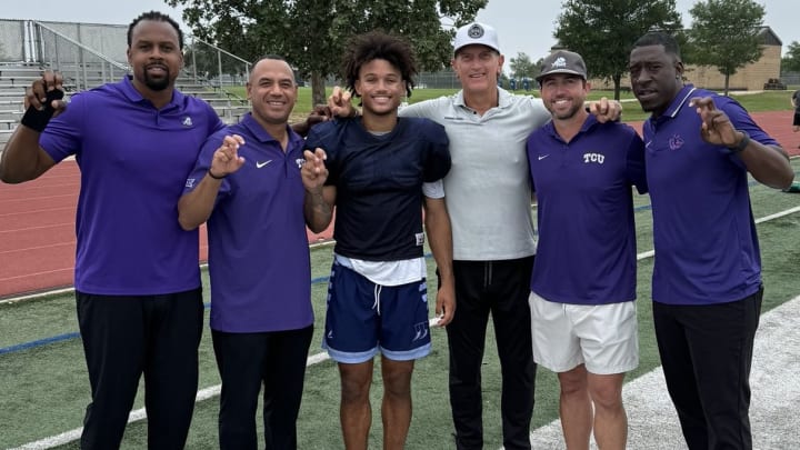 Ty Hawkins is visited by TCU football staff at a San Antonio Johnson High School (Texas) practice. The 4-star quarterback is committed to TCU.