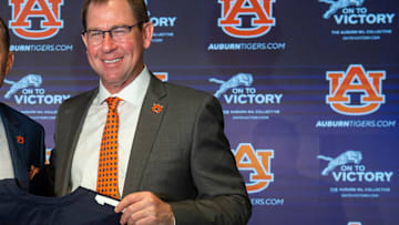 Auburn University AD John Cohen made the call to retire Cam Newton's Tigers jersey number this season