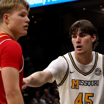 Nov 9, 2025; Columbia, Missouri, USA; Missouri Tigers forward Luke Northweather (45) prepares to defend VMI guard Linus Holmstrom (4) against the VMI Keydets at Mizzou Arena. 