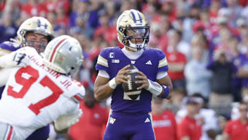 Sep 27, 2025; Seattle, Washington, USA; Washington Huskies quarterback Demond Williams Jr. (2) looks to pass against the Ohio State Buckeyes during the second quarter at Husky Stadium. Mandatory Credit: Joe Nicholson-Imagn Images