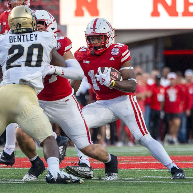 Nebraska running back Rahmir Johnson rushes for a short gain during the second quarter against Colorado.