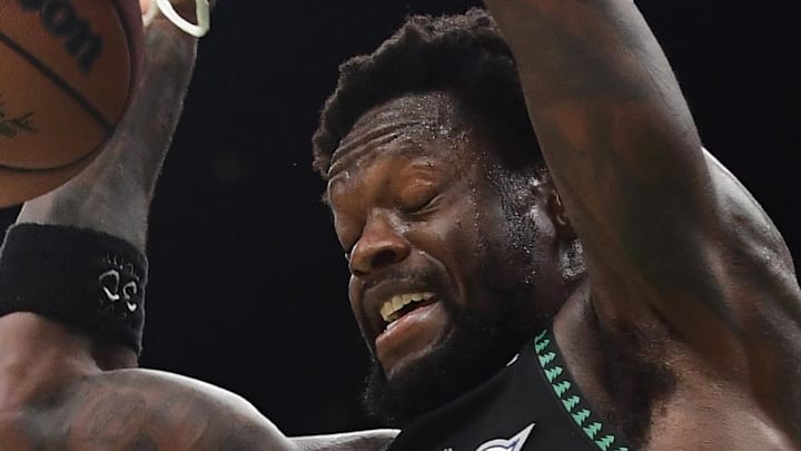 Mar 22, 2026; Boston, Massachusetts, USA; Minnesota Timberwolves forward Julius Randle (30) dunks the ball during the second half against the Boston Celtics at TD Garden. Mandatory Credit: Bob DeChiara-Imagn Images