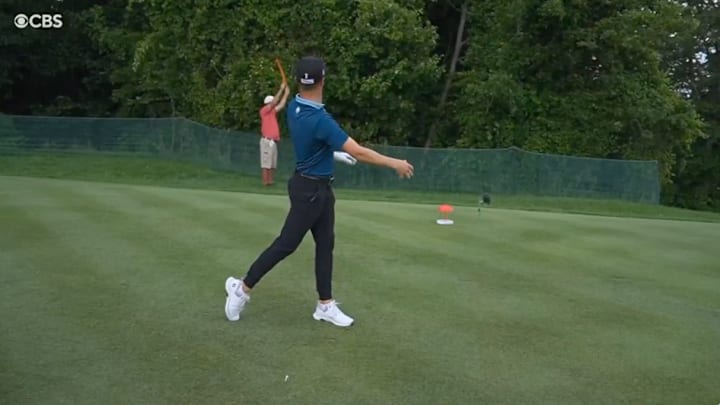 Justin Thomas quickly apologized to the volunteer almost hitting him with his driver. Justin Thomas quickly apologized to the volunteer almost hitting him with his driver.