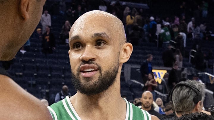 Feb 19, 2026; San Francisco, California, USA; Golden State Warriors center Al Horford (20) greets former teammate Boston Celtics guard Derrick White (9) following their game at Chase Center. Mandatory Credit: D. Ross Cameron-Imagn Images
