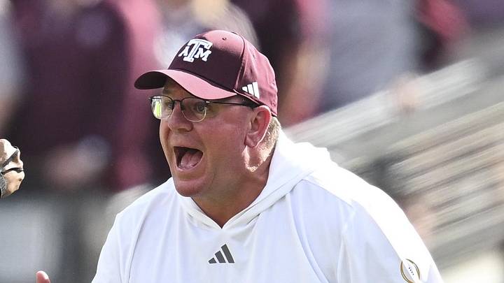 Dec 20, 2025; College Station, TX, USA; Texas A&M Aggies head coach Mike Elko reacts during the second half of the first round game of the CFP National Playoff against the Miami Hurricanes at Kyle Field. Mandatory Credit: Maria Lysaker-Imagn Images