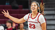 Carly Keats (23) celebrates after hitting a three against the Southeast Missouri Redhawks. Arkansas won 84-45.
