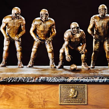 The bronze trophy for the Joe Moore Award will go to the Most Outstanding Offensive Line Unit in college football and, at more than 350 pounds, is the largest trophy in college football.