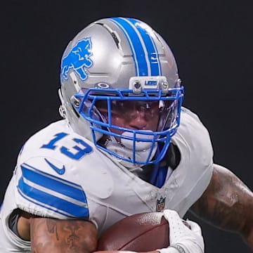 Detroit Lions running back Craig Reynolds (13) runs the ball against the Atlanta Falcons in the second quarter 