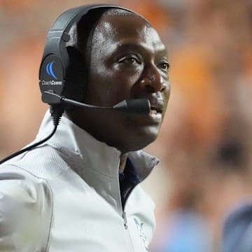 Kent State football coach Kenni Burns on the sidelines at the NCAA College football game against Tennessee on Saturday, September 14, 2024, in Knoxville, Tenn.