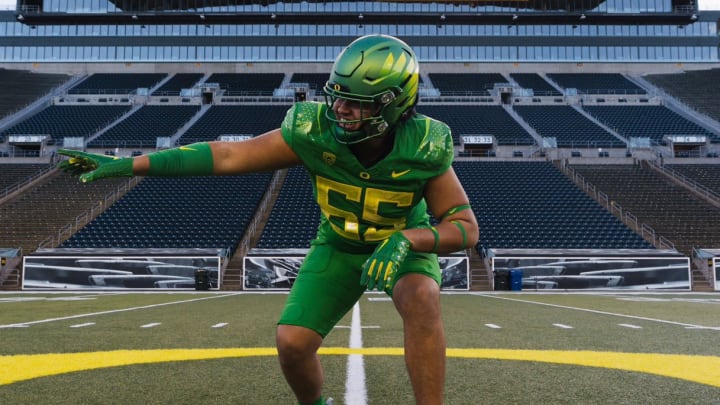 2026 four-star offensive tackle Kodi Greene wears an Oregon Ducks uniform during a visit to Eugene.