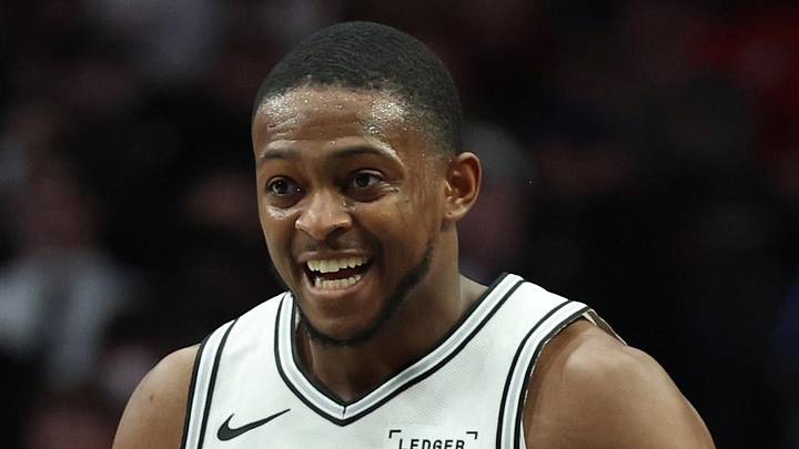 San Antonio Spurs guard De'Aaron Fox (4) reacts after making a three-point shot in the second half against the Portland Trail Blazers at Moda Center on November 26, 2025.