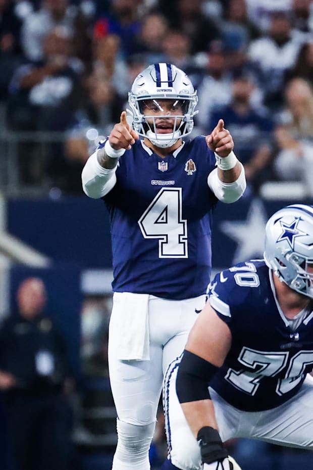 Dallas Cowboys quarterback Dak Prescott points during the second half against the Los Angeles Rams