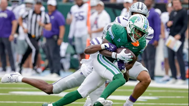 Tulane wide receiver Mario Williams (4) makes a long pass reception against Kansas State during the second half of an NCAA football game at Yulman Stadium in New Orleans, Saturday, Sept. 7, 2024.