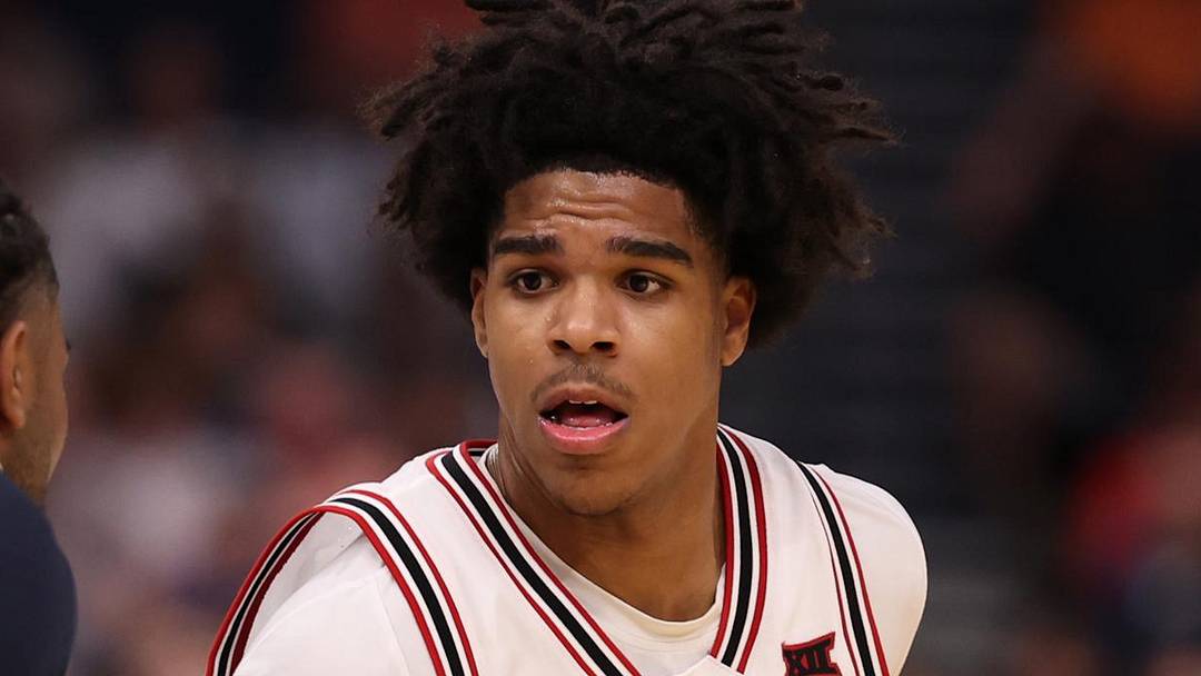 Mar 20, 2026; Tampa, FL, USA; Texas Tech Red Raiders guard Christian Anderson (4) dribbles against Akron Zips guard Evan Mahaffey (12) in the first half during a first round game of the men's 2026 NCAA Tournament at Benchmark International Arena. Mandatory Credit: Matt Pendleton-Imagn Images