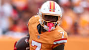 Oct 27, 2024; Tampa, Florida, USA; Tampa Bay Buccaneers running back Bucky Irving (7) runs with the ball against the Atlanta Falcons in the third quarter at Raymond James Stadium. Mandatory Credit: Nathan Ray Seebeck-Imagn Images
