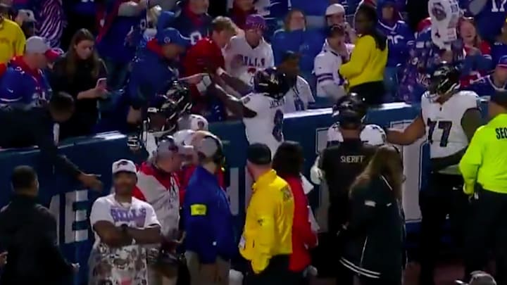 Lamar Jackson shoved a fan who hit him and DeAndre Hopkins.