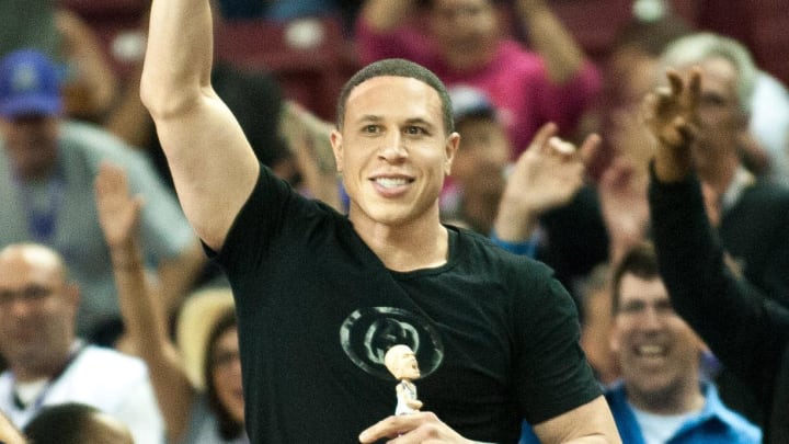 Apr 5, 2016; Sacramento, CA, USA; Former Sacramento Kings guard Mike Bibby waves to the crowd during a timeout in the game against the Portland Trail Blazers at Sleep Train Arena. Mandatory Credit: Ed Szczepanski-USA TODAY Sports