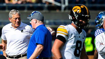 Iowa head coach Kirk Ferentz, left, talks with Kentucky head coach Mark Stoops at midfield before a NCAA college football game in the Vrbo Citrus Bowl, Saturday, Jan. 1, 2022, at Camping World Stadium in Orlando, Fla.

220101 Iowa Kentucky Citrus Fb Extra 001 Jpg