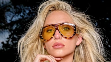 Alix Earle was photographed by Yu Tsai in Mexico. Sunglasses by Tom Ford.