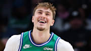 Nov 10, 2025; Dallas, Texas, USA;  Dallas Mavericks forward Cooper Flagg (32) laughs during the third quarter against the Milwaukee Bucks at American Airlines Center. Mandatory Credit: Kevin Jairaj-Imagn Images