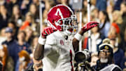 Alabama wide receiver Isaiah Horton hits the Crimson Crane after a touchdown in the first half of the Iron Bowl on November 29, 2025.
