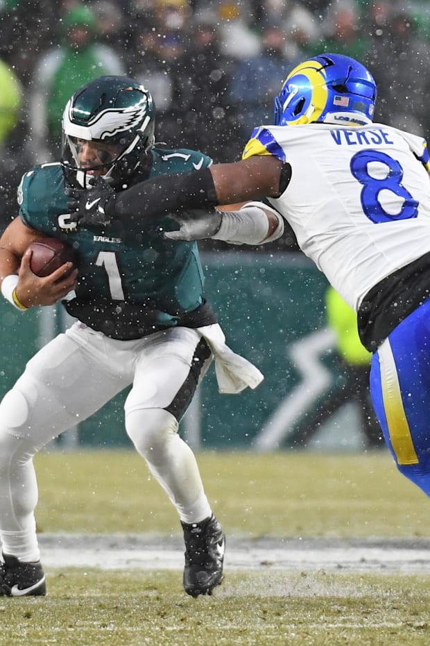 Rams linebacker Jared Verse (8) sacks Philadelphia Eagles quarterback Jalen Hurts