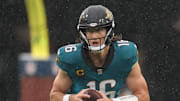 Dec 7, 2025; Jacksonville, Florida, USA;  Jacksonville Jaguars quarterback Trevor Lawrence (16) rolls out against the Indianapolis Colts during the second half at EverBank Stadium. Mandatory Credit: Matt Pendleton-Imagn Images