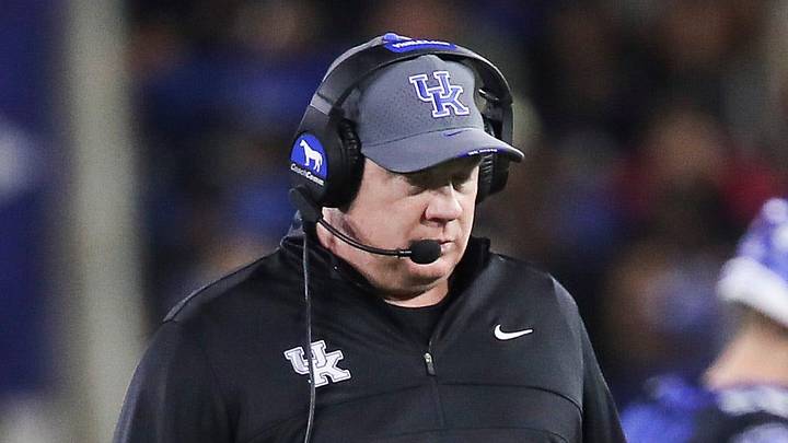 Kentucky head coach Mark Stoops walks the field during a time out as his special teams practice snapping the ball for extra point attempts at Kroger Field Saturday, Oct. 12, 2024 in Lexington, Ky.