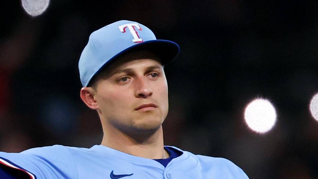 Jun 15, 2025; Arlington, Texas, USA;  Texas Rangers shortstop Corey Seager (5) warms up during the ninth inning against the Chicago White Sox at Globe Life Field. Mandatory Credit: Kevin Jairaj-Imagn Images