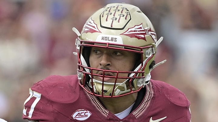 Oct 11, 2025; Tallahassee, Florida, USA; Florida State Seminoles running back Gavin Sawchuk (27) runs the ball past Pittsburgh Panthers linebacker Kyle Louis (9) during the first half at Doak S. Campbell Stadium. Mandatory Credit: Melina Myers-Imagn Images Oct 11, 2025; Tallahassee, Florida, USA; Florida State Seminoles running back Gavin Sawchuk (27) runs the ball past Pittsburgh Panthers linebacker Kyle Louis (9) during the first half at Doak S. Campbell Stadium. Mandatory Credit: Melina Myers-Imagn Images