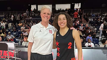 Aaliyah Chavez (right) poses with her high school coach Jill Schneider one last time after winning the game MVP honors Friday at the Jordan Brand Classic in Washington D.C. 