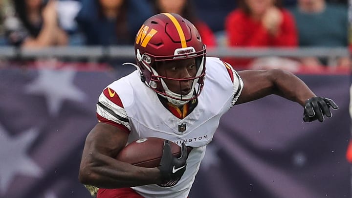 Nov 5, 2023; Foxborough, Massachusetts, USA; Washington Commanders receiver Byron Pringle (3) runs after a catch during the first half against the New England Patriots at Gillette Stadium. Mandatory Credit: Paul Rutherford-Imagn Images