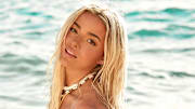 Olivia Dunne was photographed by Ben Watts in Bermuda. Swimsuit by Juliet Johnstone.