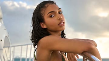 Lori Harvey was photographed by Yu Tsai in Mexico. Swimsuit by Yevrah Swim. Body Chain by Goldish.