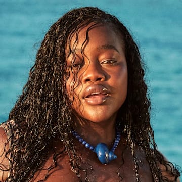 Achieng Agutu was photographed by Ben Watts in Bermuda. Swimsuit by White Fox. Necklace by Julietta.