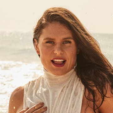 Ilona Maher was photographed by Ben Watts in Bellport, New York. Swimsuit by ALAÏA. 
