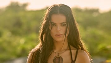 Brooks Nader was photographed by Yu Tsai in Mexico. Swimsuit by Maygel Coronel. Necklace and Bracelet provided by New York Vintage.